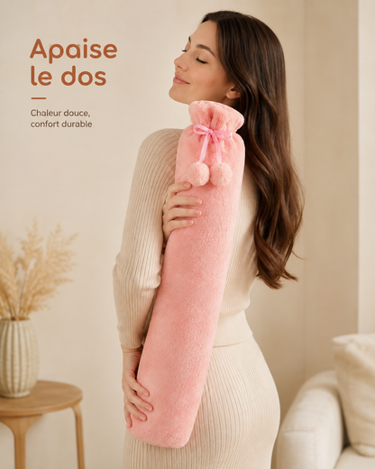 Bouillotte peluche longue rose posée le long du dos